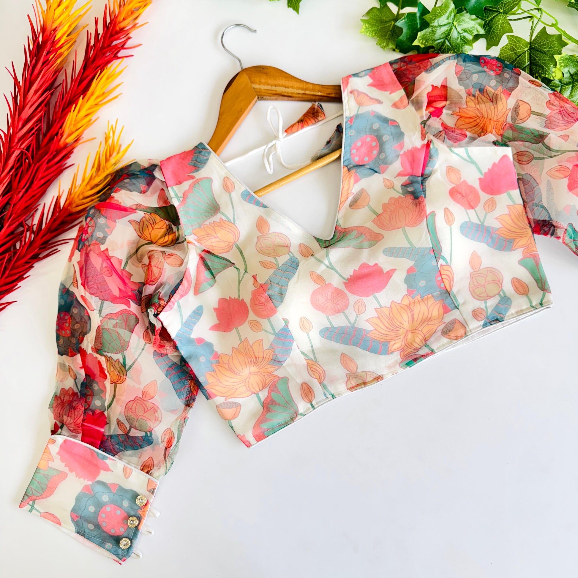 Hooriya fashions - Beautiful Kalamkari print all over blouse with beautiful buttons