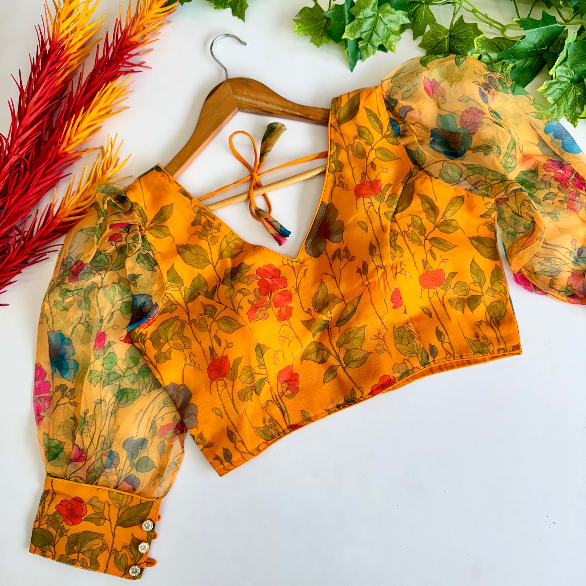 Hooriya fashions - Beautiful Kalamkari print all over blouse with beautiful buttons