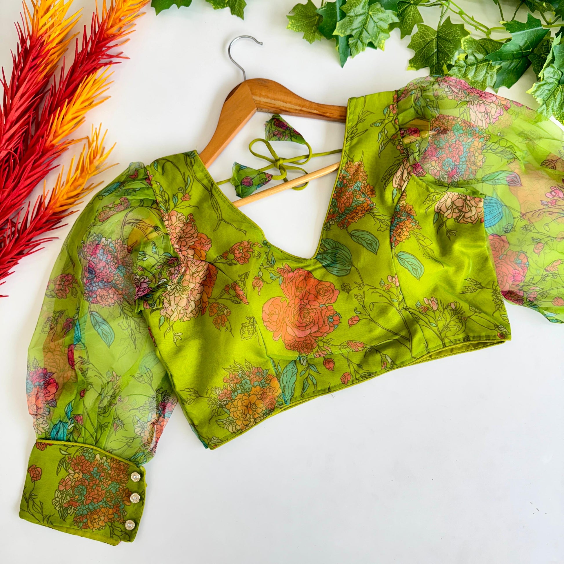 Hooriya fashions - Beautiful Kalamkari print all over blouse with beautiful buttons