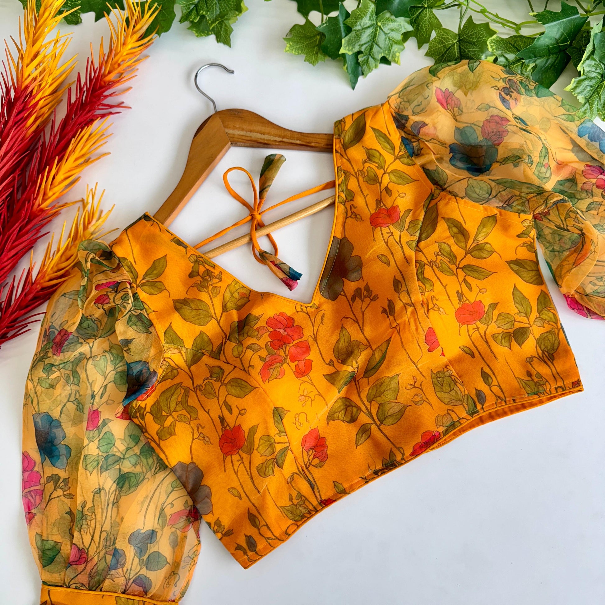 Hooriya fashions - Beautiful Kalamkari print all over blouse with beautiful buttons