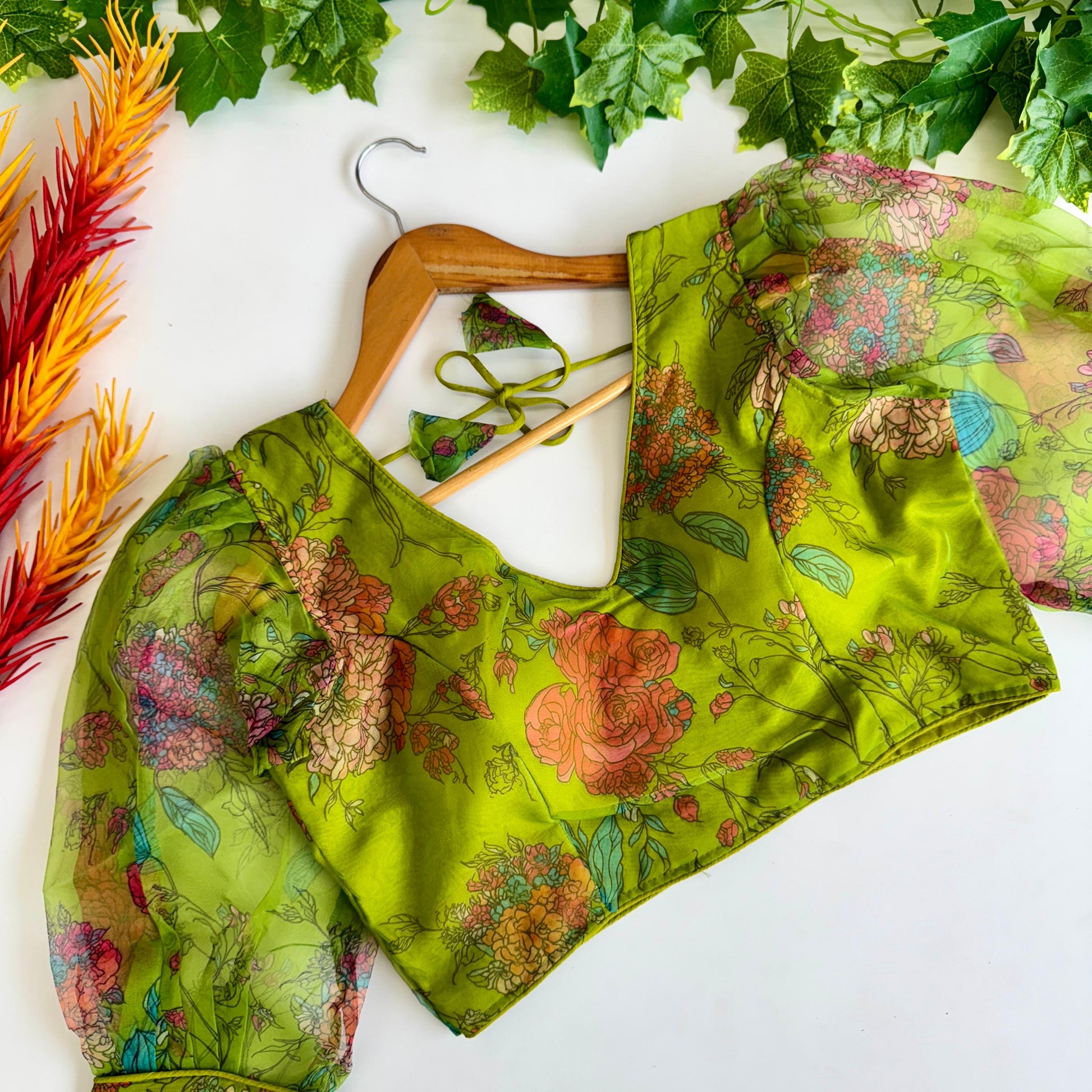Hooriya fashions - Beautiful Kalamkari print all over blouse with beautiful buttons