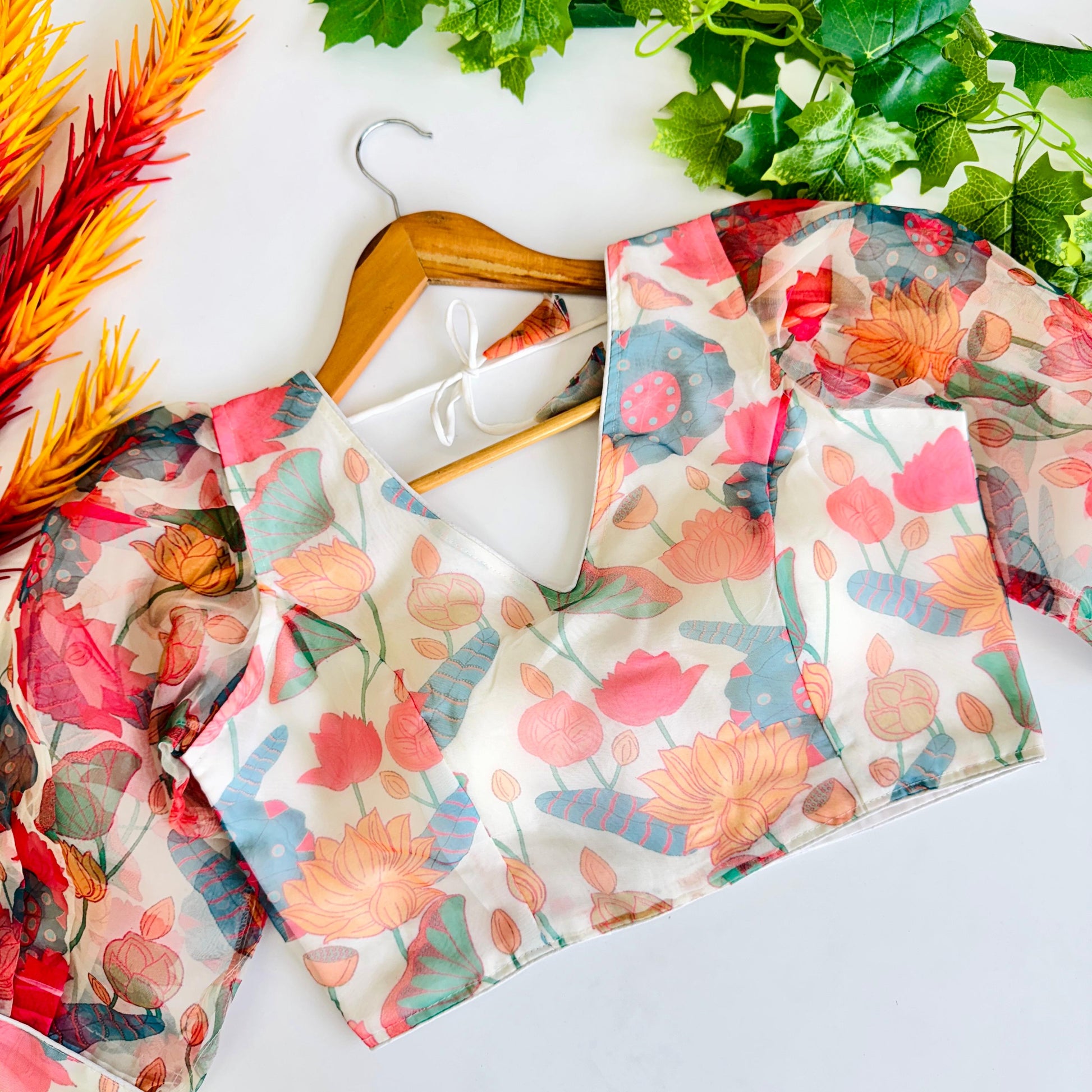 Hooriya fashions - Beautiful Kalamkari print all over blouse with beautiful buttons