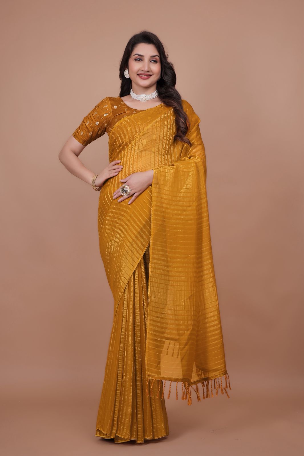 Hooriya Fashions - New premium georgette zari leheriya saree.