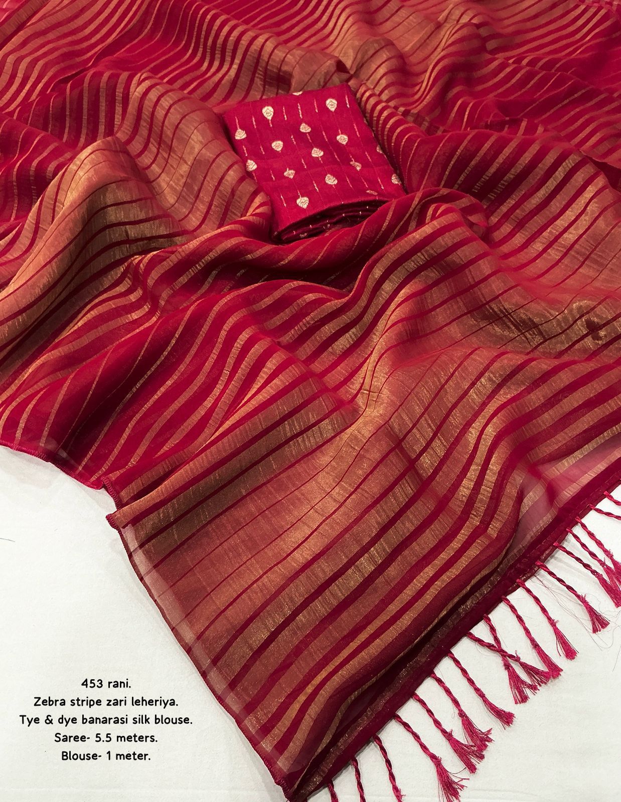 Hooriya Fashions - New premium georgette zari leheriya saree.