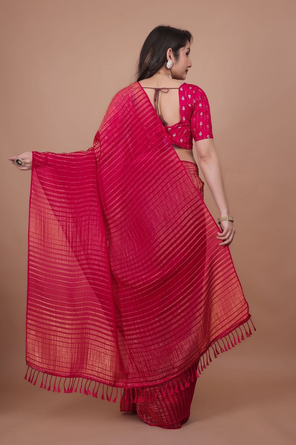 Hooriya Fashions - New premium georgette zari leheriya saree.