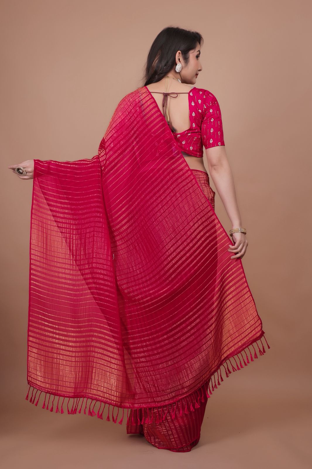 Hooriya Fashions - New premium georgette zari leheriya saree.