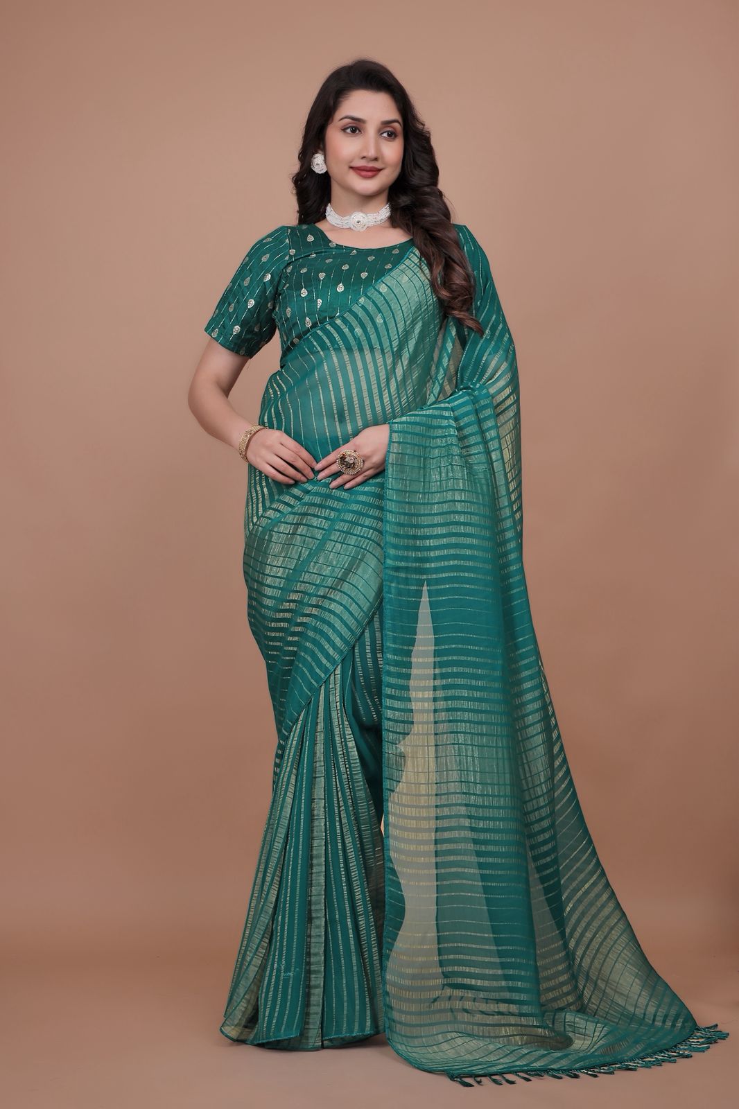 Hooriya Fashions - New premium georgette zari leheriya saree.