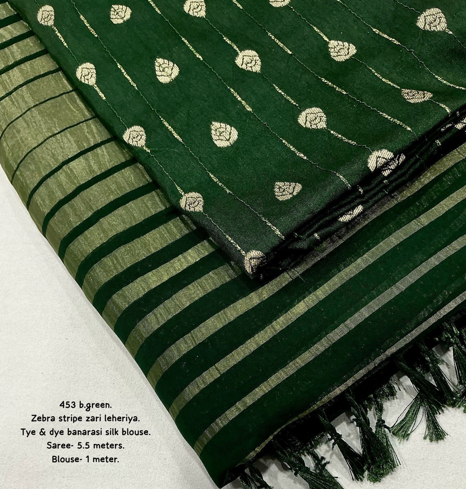 Hooriya Fashions - New premium georgette zari leheriya saree.