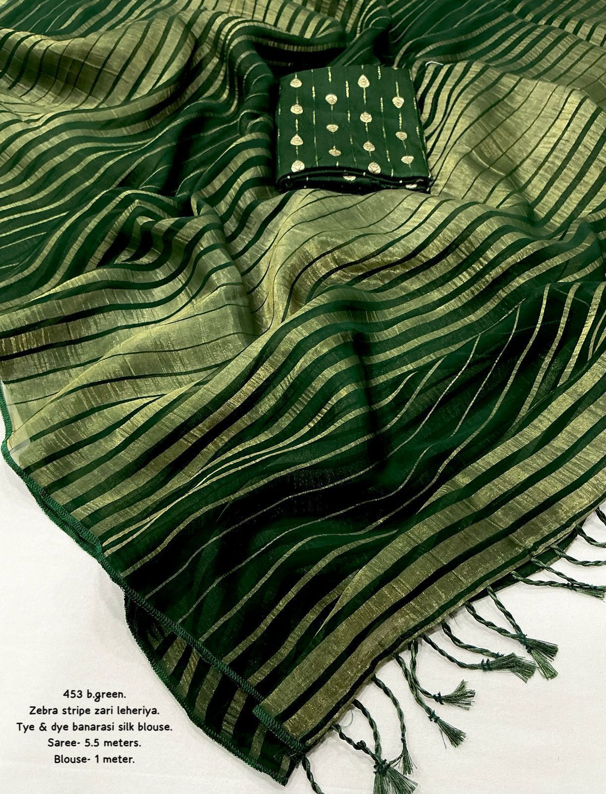 Hooriya Fashions - New premium georgette zari leheriya saree.