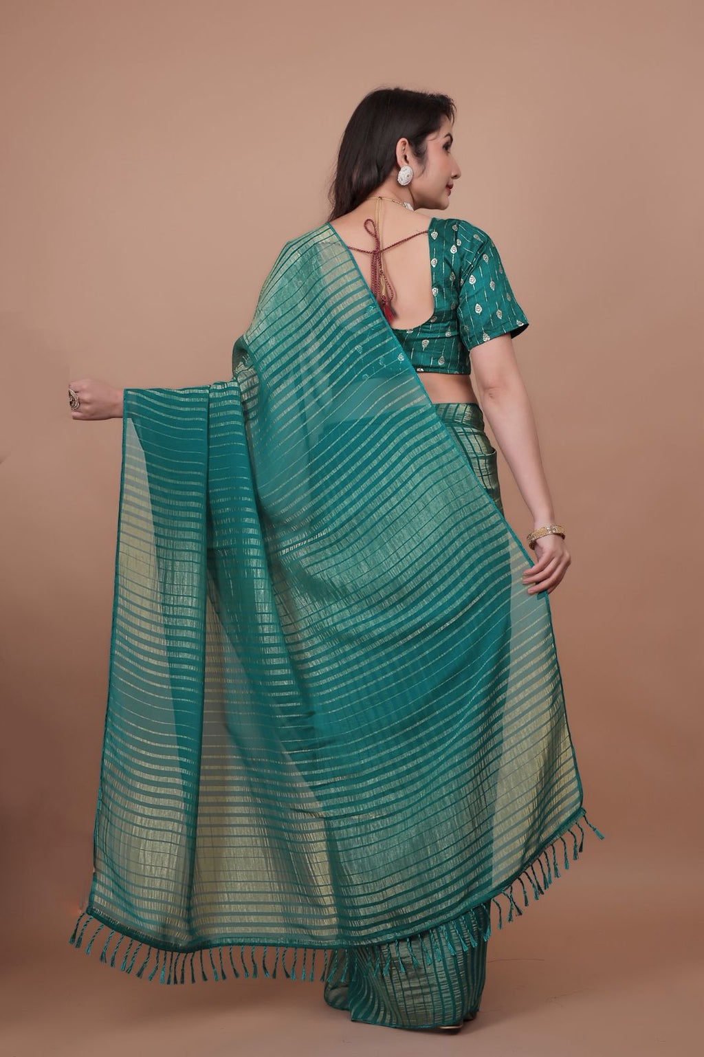 Hooriya Fashions - New premium georgette zari leheriya saree.