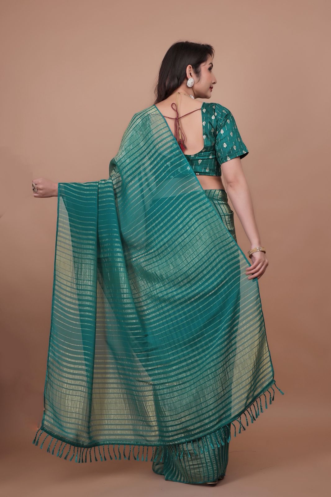 Hooriya Fashions - New premium georgette zari leheriya saree.