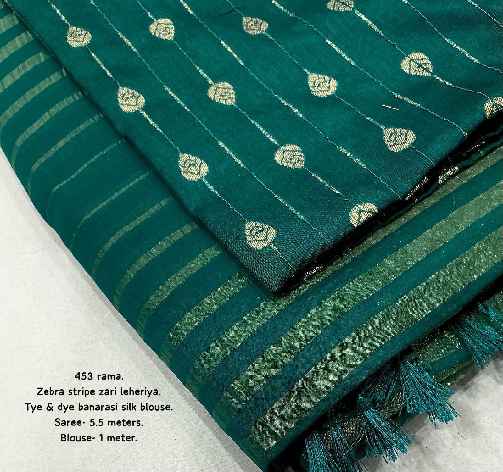 Hooriya Fashions - New premium georgette zari leheriya saree.