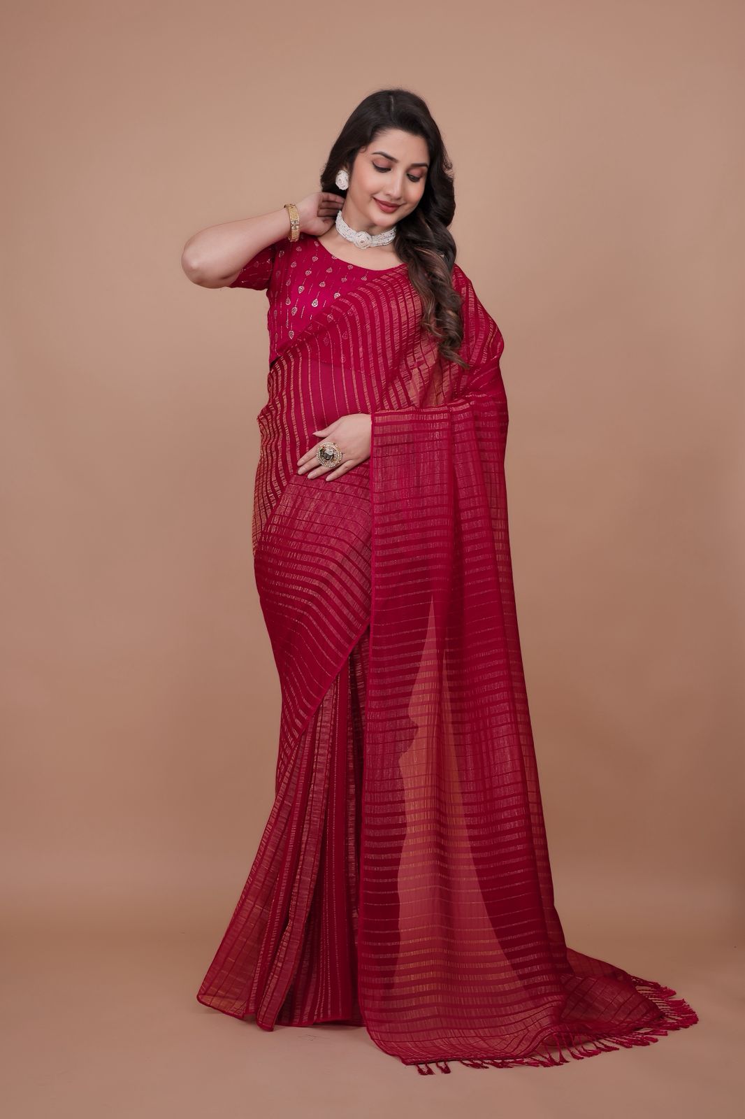 Hooriya Fashions - New premium georgette zari leheriya saree.