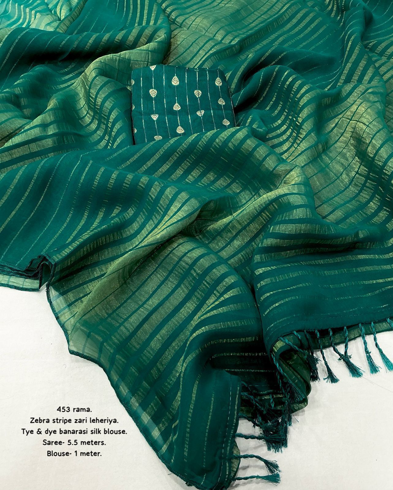 Hooriya Fashions - New premium georgette zari leheriya saree.