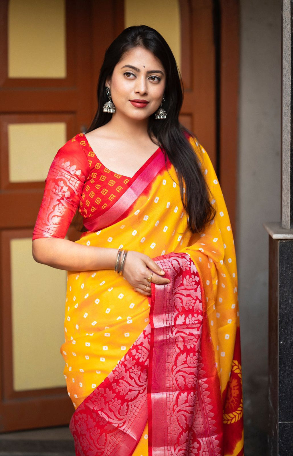 Hooriya Fashions - soft jute silk saree with allover bandez print and cut broaso border.