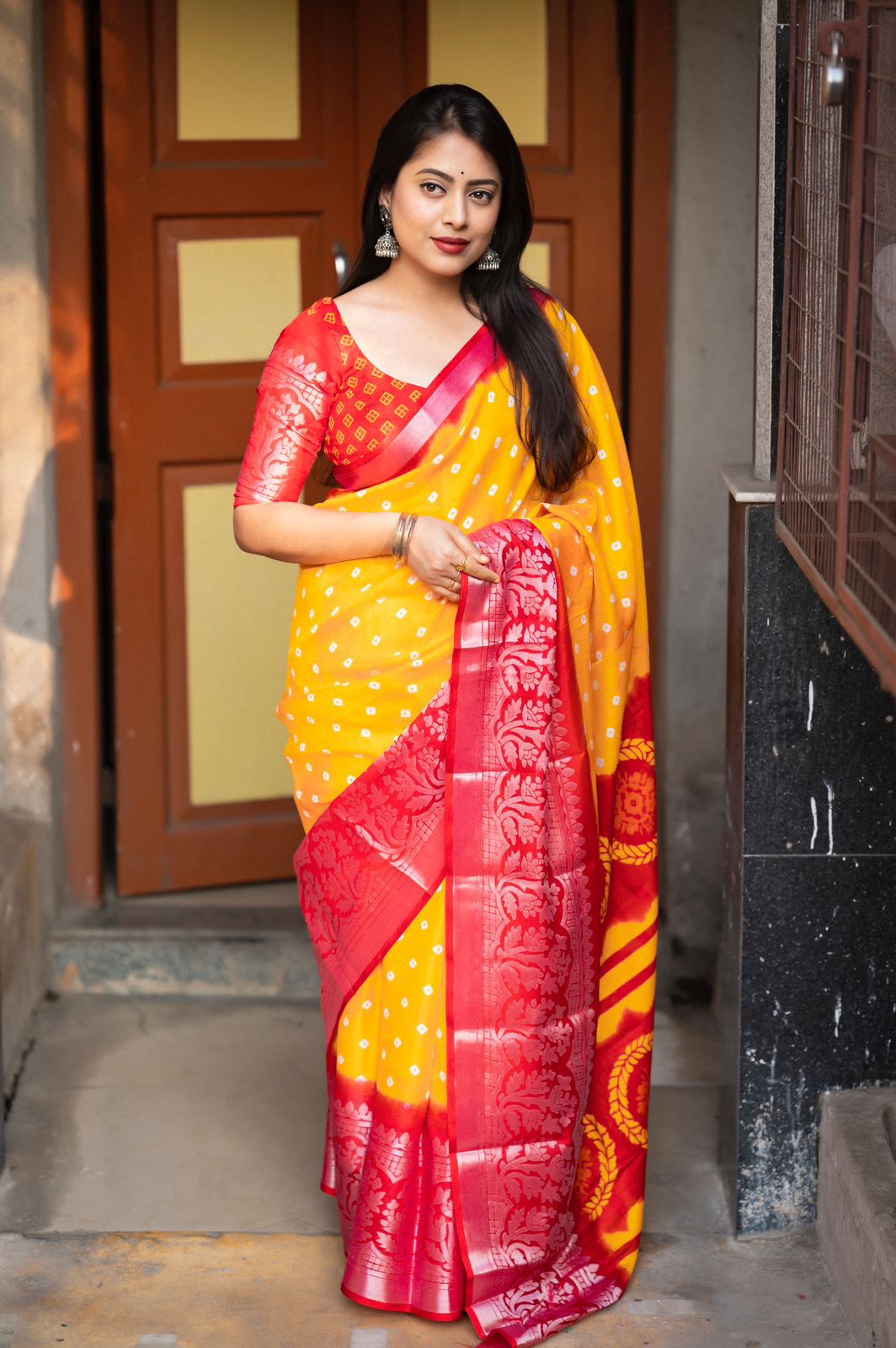 Hooriya Fashions - soft jute silk saree with allover bandez print and cut broaso border.