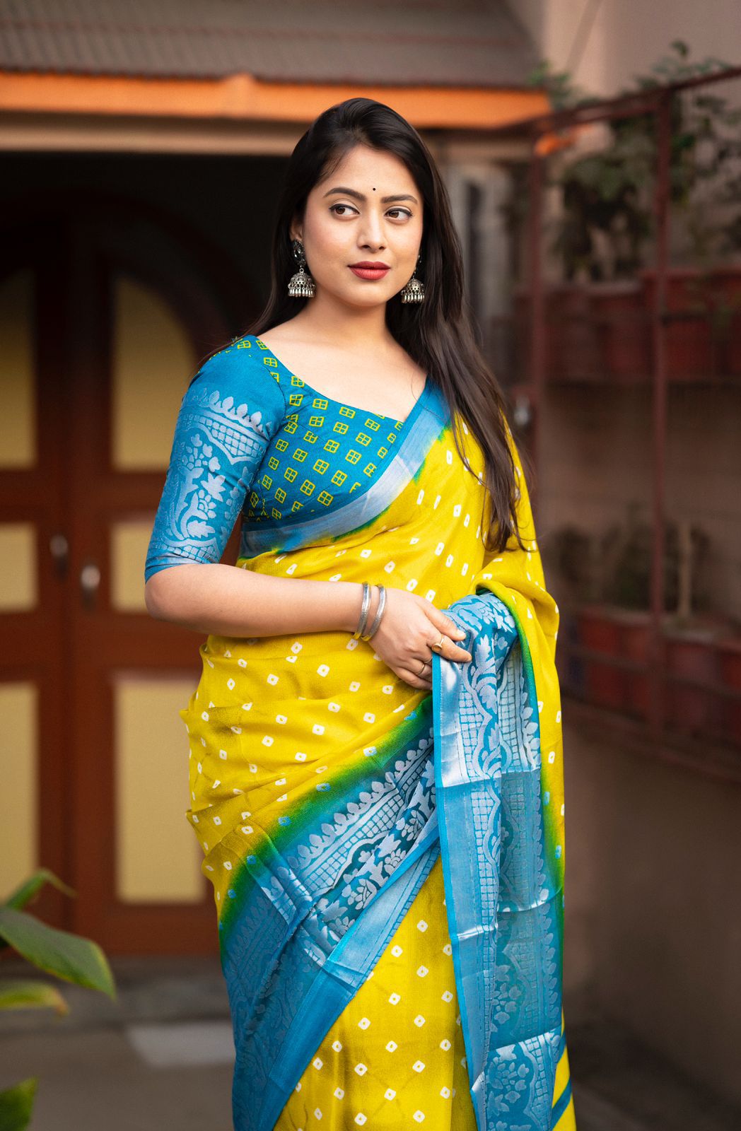 Hooriya Fashions - soft jute silk saree with allover bandez print and cut broaso border.