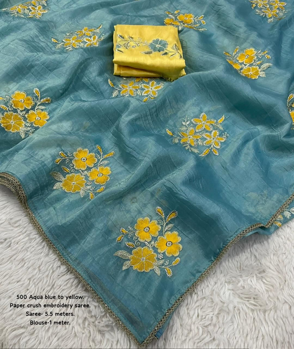 Hooriya Fashions - Soft paper crush saree with heavy embroidery buttas.