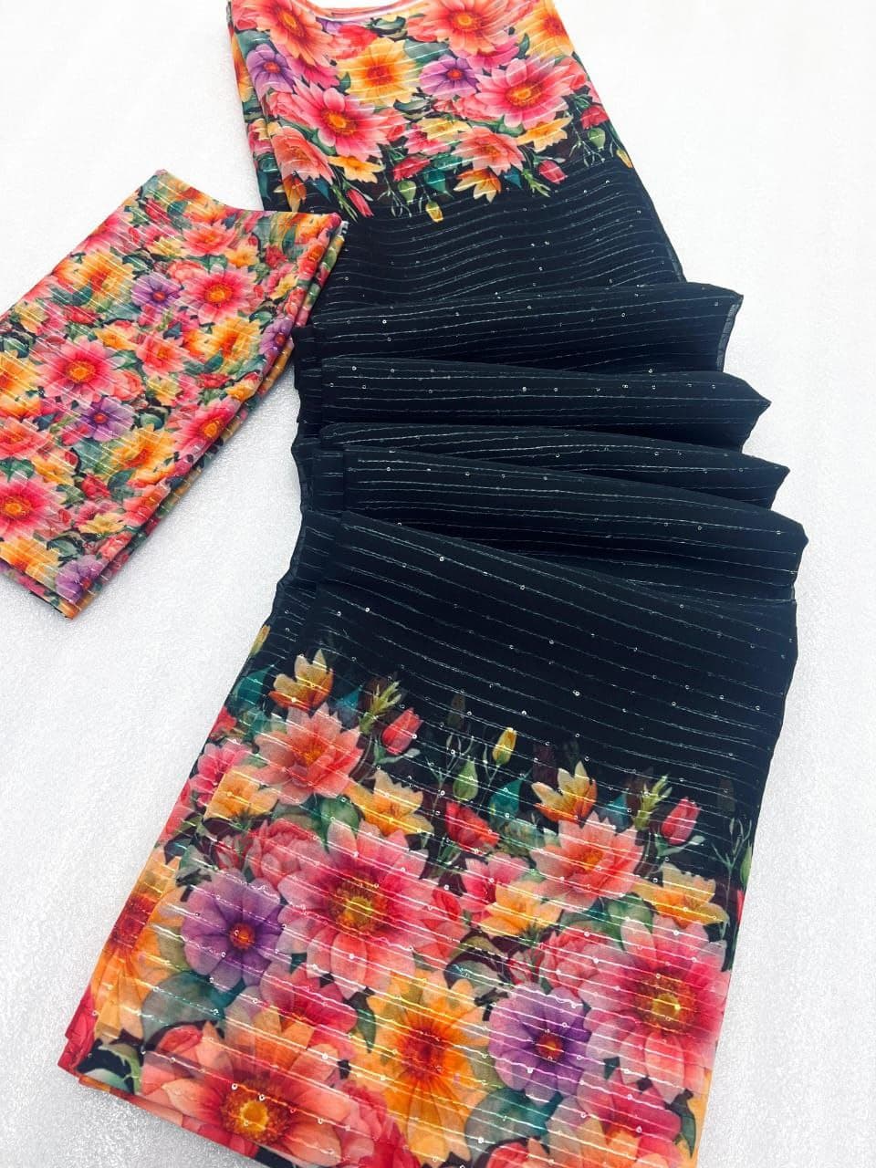 Hooriya floral fashion black fabric with vibrant multicolor floral prints laid flat
