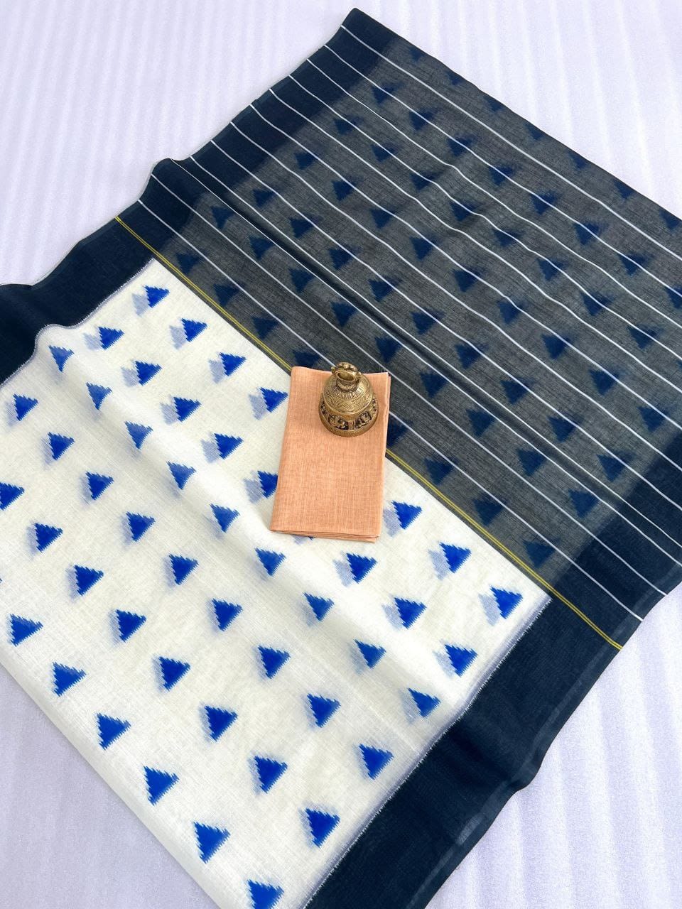 Hooriya premium saree with blue triangle pattern and striped dark blue border fabric by Hooriya Fashions