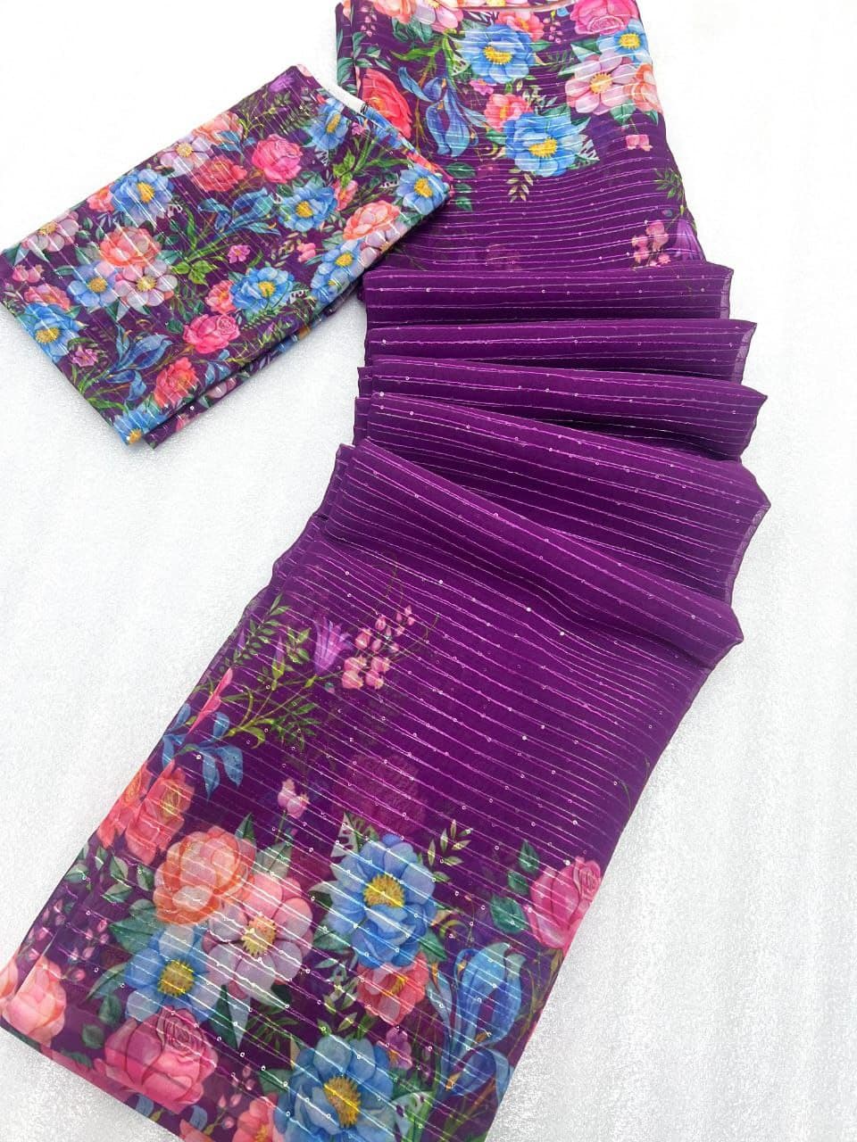 Purple and multicolor floral premium Georgette traditional wear fabric set with intricate patterns