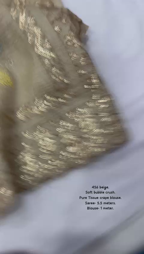 Hooriya fashions - Soft bubble crush saree in beige color.