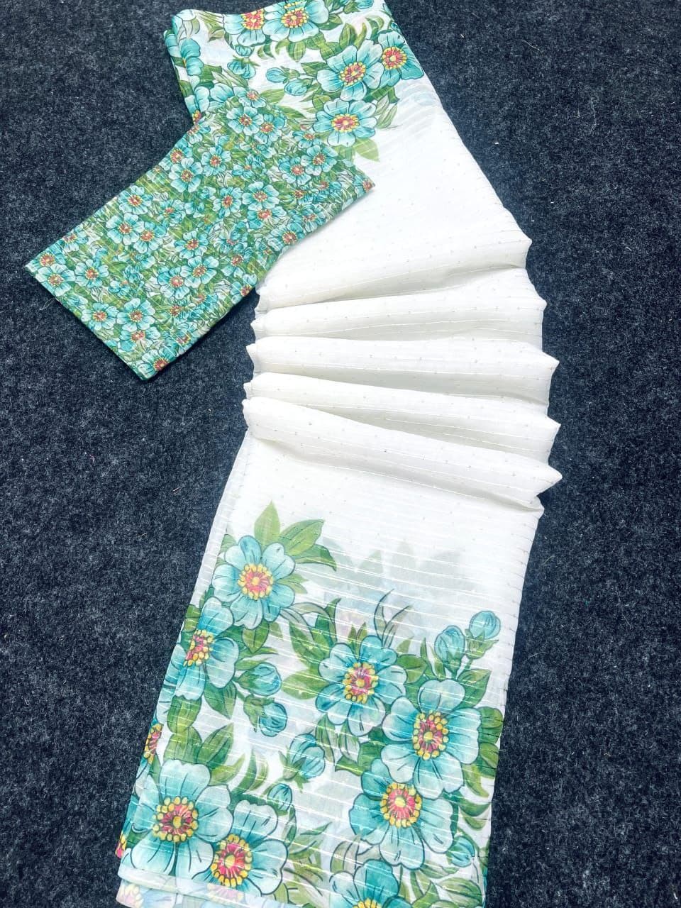 White fabric with blue floral embroidery in pure Georgette with Crochet by Hooriya Fashions