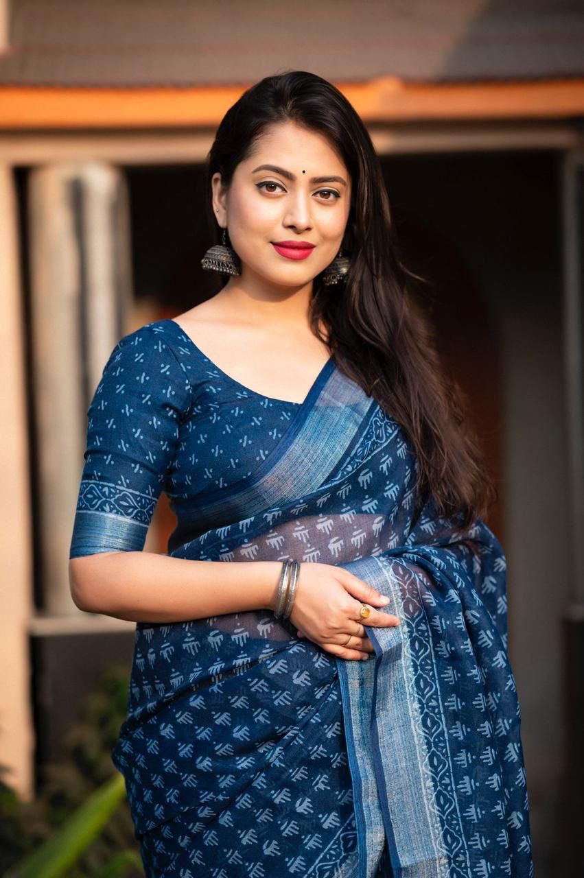Hooriya Fashions - New linen pattu border printed Saree.