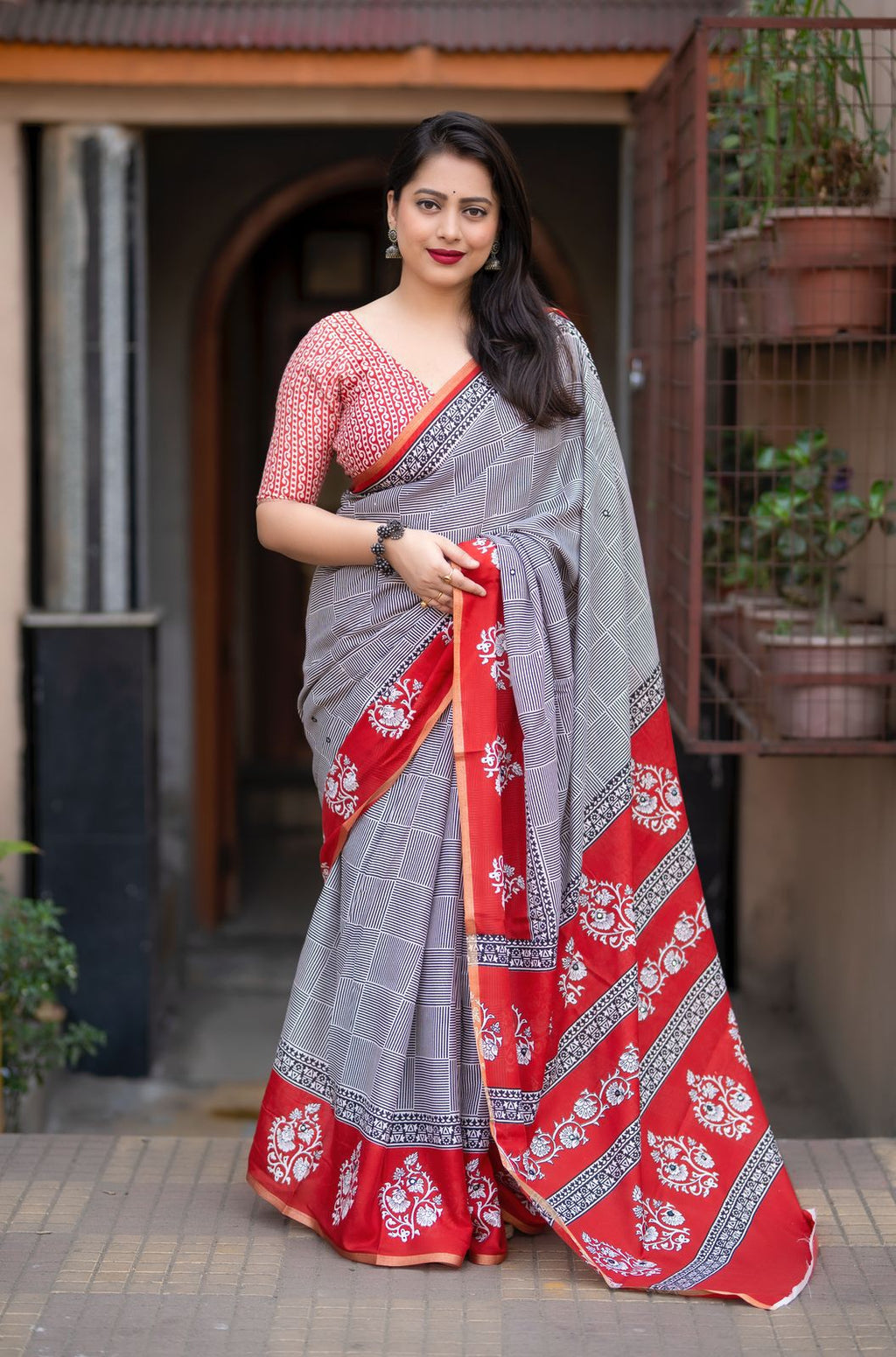 Hooriya Fashions -New single color edition ajrakh cotton saree