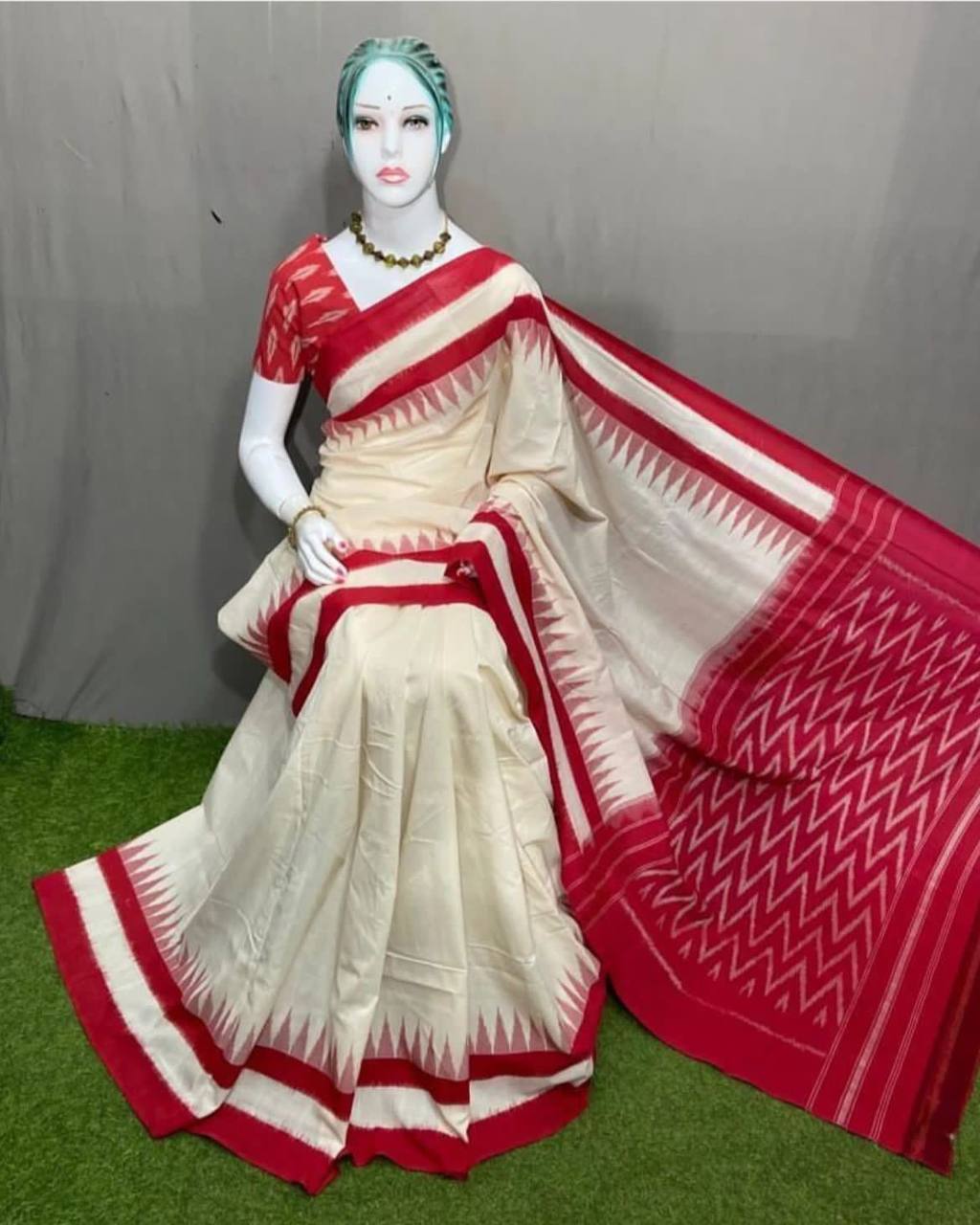 Hooriya Fashions traditional modern saree in cream with red geometric borders and blouse