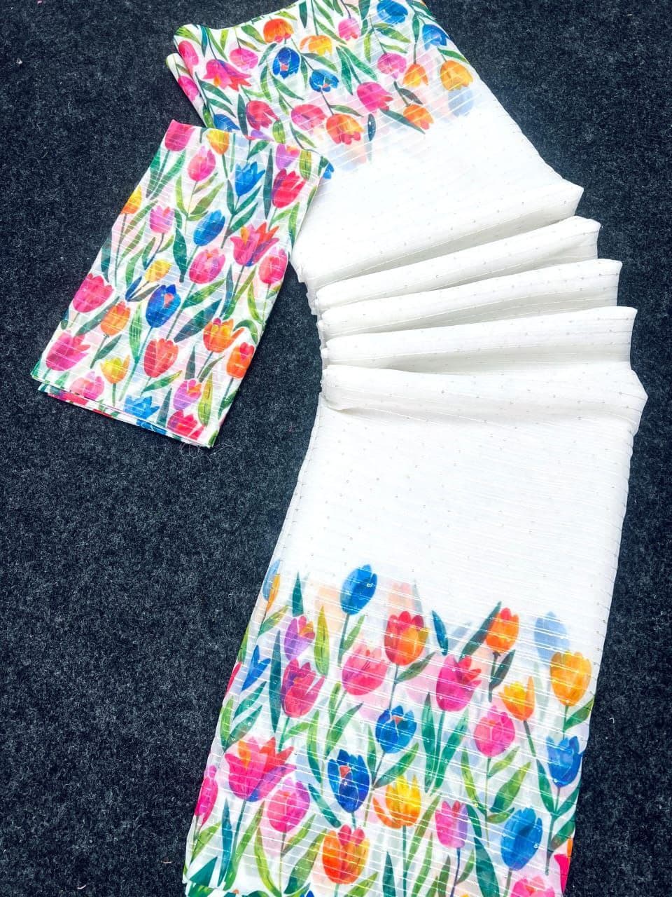 White Floral Saree with colorful tulip flower patterns and green leaves by Hooriya Fashions